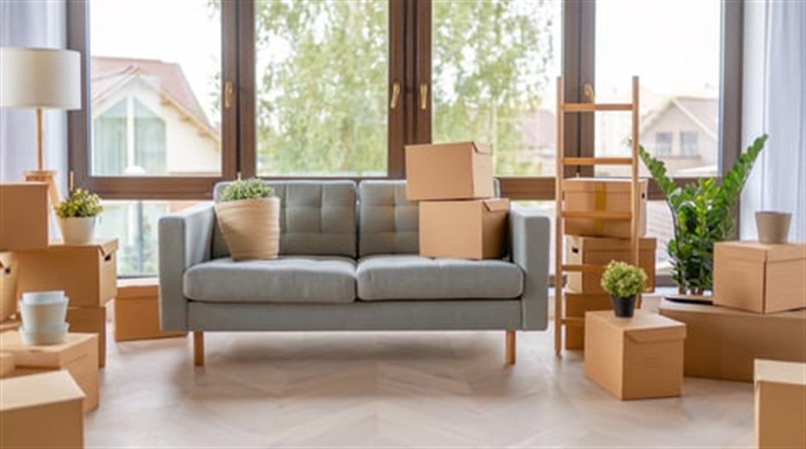Living room packed with moving boxes ready for a residential move in Gaithersburg, Maryland
